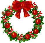 A Christmas wreath with a red ribbon, ornaments, and candy canes 